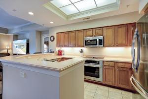Kuchyň nebo kuchyňský kout v ubytování 301 Main Sail