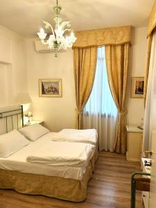 Posteľ alebo postele v izbe v ubytovaní Villa Casanova
