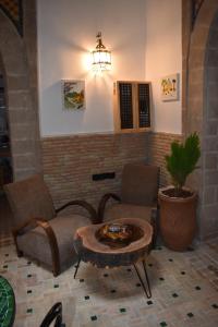 Posezení v ubytování Riad Mogantique-Essaouira