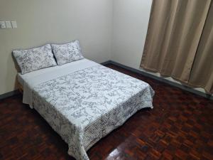 Ένα ή περισσότερα κρεβάτια σε δωμάτιο στο Carolina Hostel