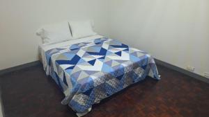 Ένα ή περισσότερα κρεβάτια σε δωμάτιο στο Carolina Hostel