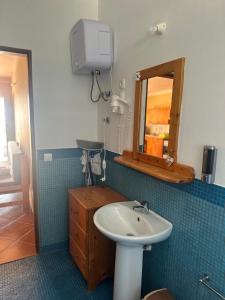 Koupelna v ubytování Garoupa Stella Maris Apartamento N10 + 6 fotografií