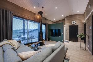 Posezení v ubytování Villa Pulla a modern holiday home in Ruka