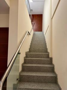 a staircase in a building with a stair case at Detail Tacoronte in Tacoronte +51 photos