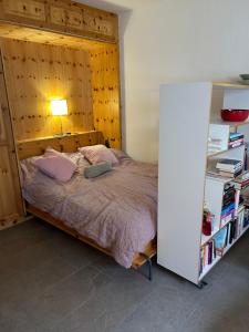 Postel nebo postele na pokoji v ubytování Studio Swiss me up!