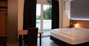 Postel nebo postele na pokoji v ubytování Hotel Good Night