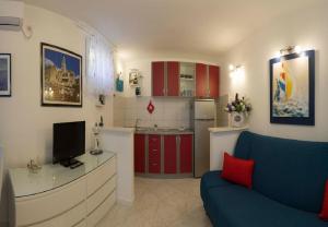 Kuchyň nebo kuchyňský kout v ubytování Apartment Mirjana