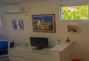 TV a/nebo společenská místnost v ubytování Apartment Mirjana