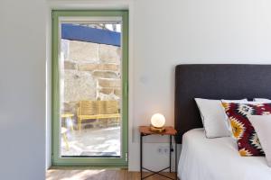 Cama ou camas em um quarto em Feel Discovery Casa de Cima Douro Valley