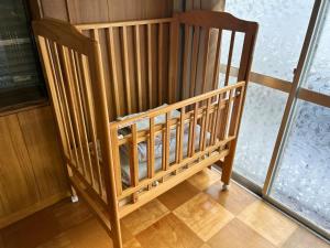 A bed or beds in a room at ポートサイドSasebo藤原町
