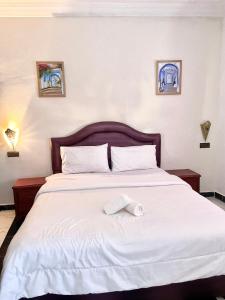 Postel nebo postele na pokoji v ubytování Hotel Riad Tetouan
