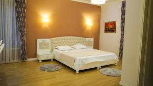 Postel nebo postele na pokoji v ubytování Garden Hotel + 37 fotografií