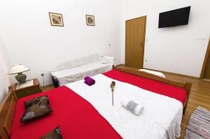Posteľ alebo postele v izbe v ubytovaní Apartments Neva