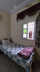 Postel nebo postele na pokoji v ubytování hôtel oasis tinghir