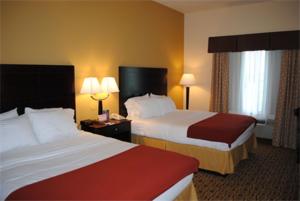 a hotel room with two beds and two lamps at Holiday Inn Express Boonville, an IHG Hotel in Boonville