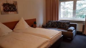 Letto o letti in una camera di Hotel Walz