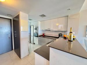 Kuchyň nebo kuchyňský kout v ubytování Nova Beach Paradise Apartment