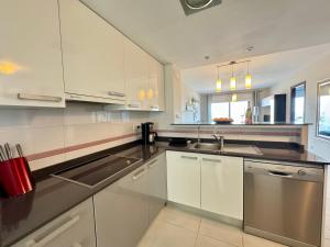 Kuchyň nebo kuchyňský kout v ubytování Nova Beach Paradise Apartment