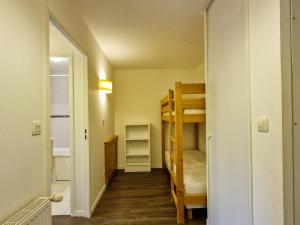 Łóżko lub łóżka w pokoju w obiekcie Appartement lumineux avec balcon sud, centre station, parking couvert - Flaine Forêt - FR-1-425-141