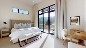 Ένα ή περισσότερα κρεβάτια σε δωμάτιο στο The Residences at One Twenty Unit 302
