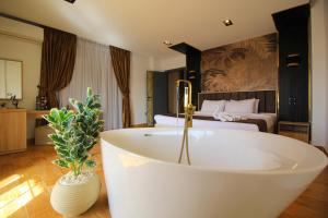 Katil atau katil-katil dalam bilik di Palm Pyramid View Inn