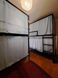 Postel nebo postele na pokoji v ubytování Hostel El Cascabel