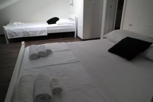Postel nebo postele na pokoji v ubytování Apartments Jadranka