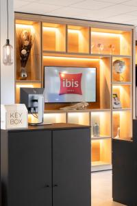 Postel nebo postele na pokoji v ubytování Ibis Lugano Paradiso