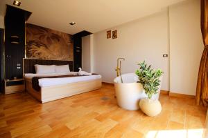 Katil atau katil-katil dalam bilik di Palm Pyramid View Inn