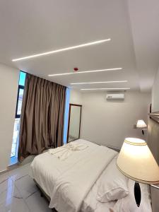 Jerash Hotel客房内的一张或多张床位
