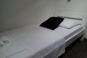 Postel nebo postele na pokoji v ubytování Apartments Jadranka