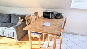 Χώρος καθιστικού στο Moderne Einliegerwohnung am Wald +10 φωτογραφίες