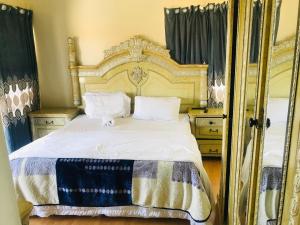 Ένα ή περισσότερα κρεβάτια σε δωμάτιο στο Sunset Bay Lodge +3 φωτογραφίες