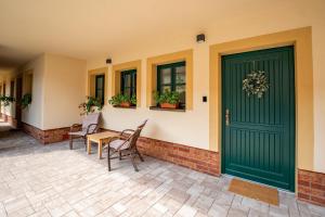 Fotografie z fotogalerie ubytování Apartmány V zahradě v destinaci Troubsko