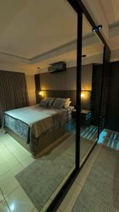 Postel nebo postele na pokoji v ubytování Compacto de luxo - Setor Oeste + 9 fotografií