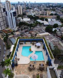 Bazén v ubytování Compacto de luxo - Setor Oeste nebo v jeho okolí