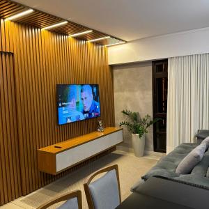 TV a/nebo společenská místnost v ubytování Compacto de luxo - Setor Oeste
