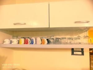 Η κουζίνα ή μικρή κουζίνα στο Luxury Homestay Hyderabad Rajendranagar +13 φωτογραφίες