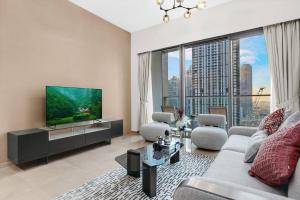 TV/Unterhaltungsangebot in der Unterkunft FIRST CLASS 1BR Charming City View
