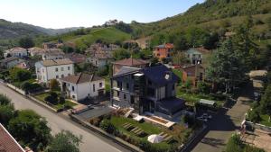 an aerial view of a small town with a house at Il Corridore - Locanda Bistrò in Felegara