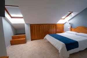 Posteľ alebo postele v izbe v ubytovaní Hotel Campomar