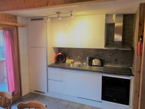Köök või kööginurk majutusasutuses Chalet Valdonga