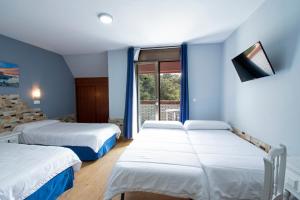 Posteľ alebo postele v izbe v ubytovaní Hotel Campomar