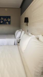 Postel nebo postele na pokoji v ubytování Holiday Inn Express Pachuca by IHG