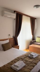 Postel nebo postele na pokoji v ubytování Motel Veljine + 11 fotografií