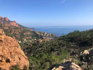 a view from the top of a mountain at Charmant petit appartement vue mer et corniche Esterel in Anthéor