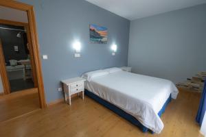 Posteľ alebo postele v izbe v ubytovaní Hotel Campomar