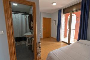 Posteľ alebo postele v izbe v ubytovaní Hotel Campomar