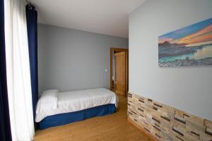 Posteľ alebo postele v izbe v ubytovaní Hotel Campomar