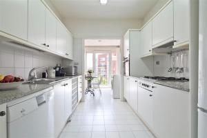 Kuchyň nebo kuchyňský kout v ubytování Stay U-nique Apartments Salvador Espriu